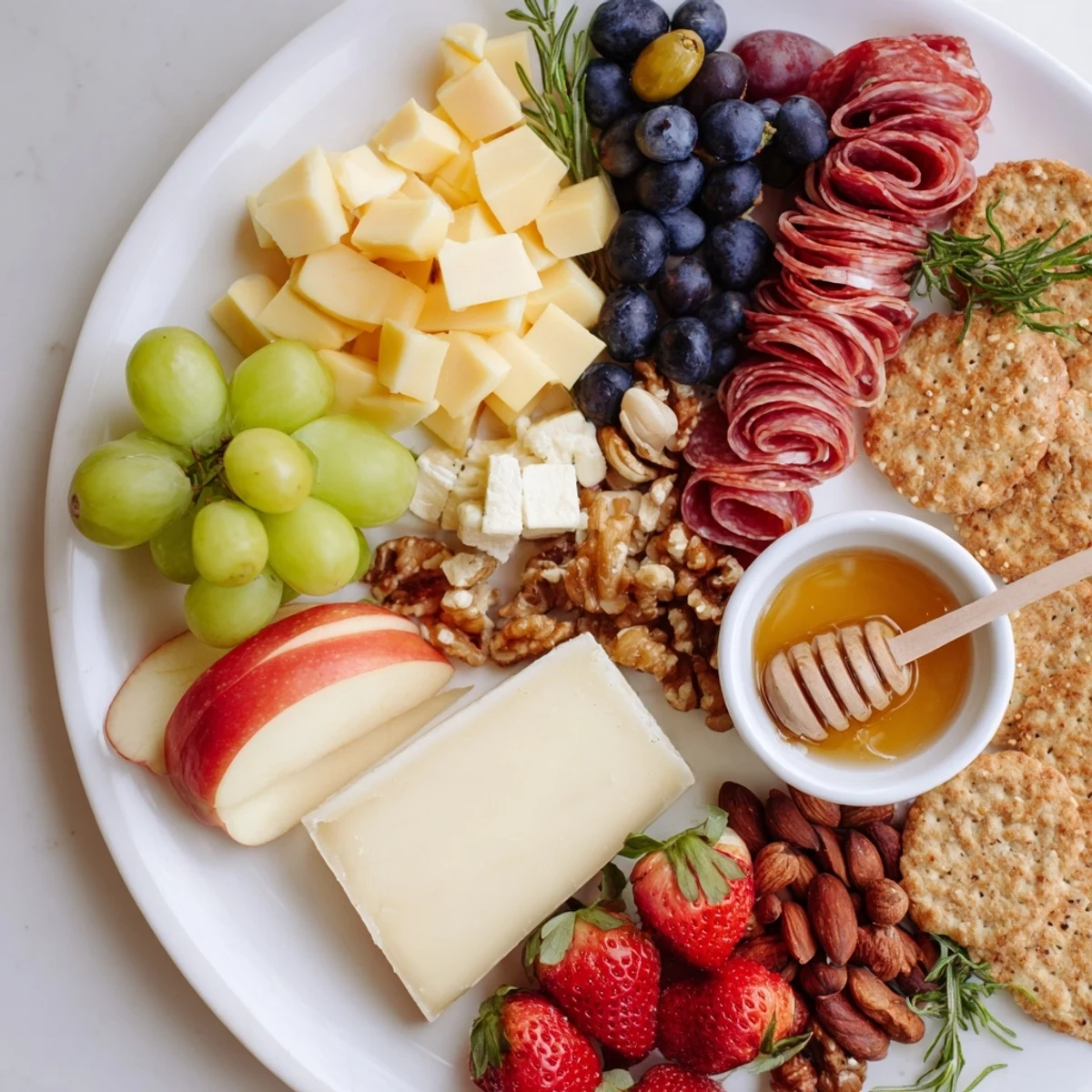 This easy Quick Charcuterie Snack Board features tempting salami, cheddar, and sweet grapes on a board.